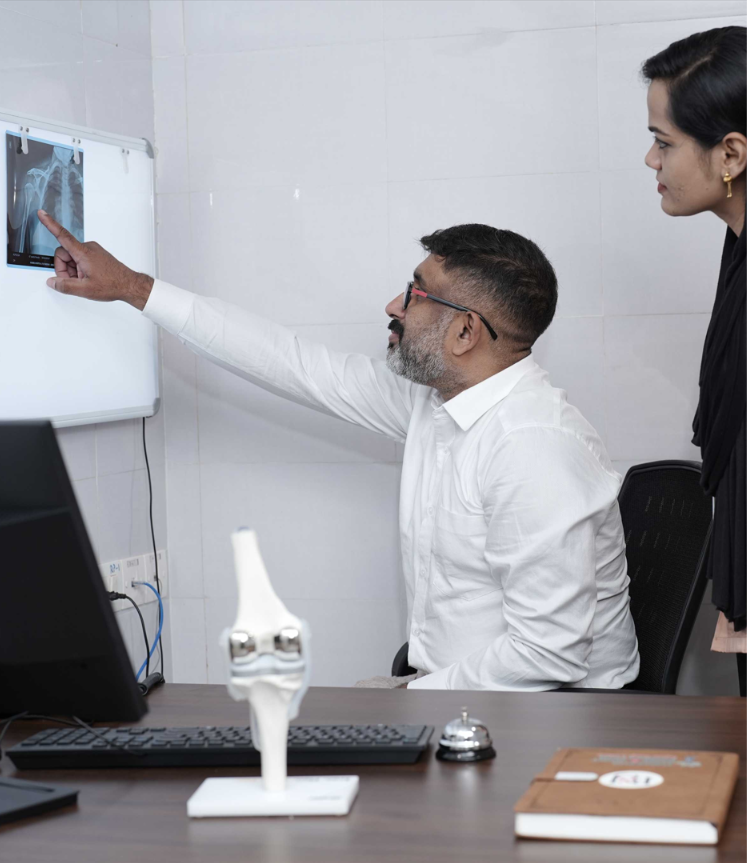 Therapist assisting a patient with rehabilitation exercises